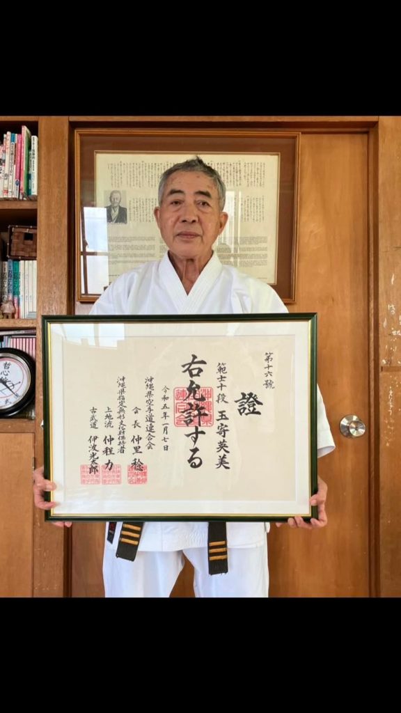 Tamayose Hidemi of the Ryukyu Kobudo Tesshinkan Kyokai receiving Hanshi Judan 2023